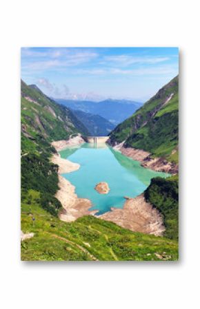 Austria - green mountain lake with dam near Grossglokner. Mosserboden dam and alpine peaks in the background .Panorama view of Stausee Wasserfallboden, Hohe Tauern Alps - Kaprun