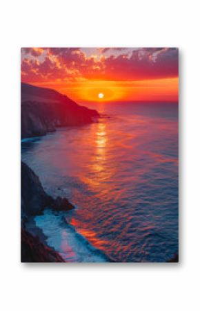 Breathtaking Sunset at Big Sur Coastline, California, Intense Red and Orange Sky Reflecting on Calm Sea, Serene Evening Landscape