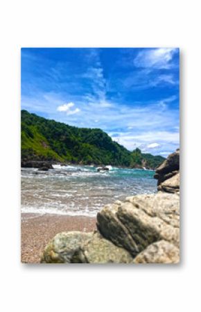 cliff at the beach of java coastline