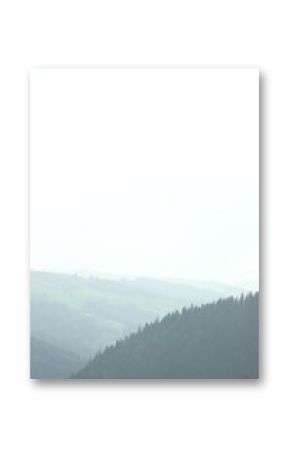 Picturesque view of beautiful mountains covered with fog