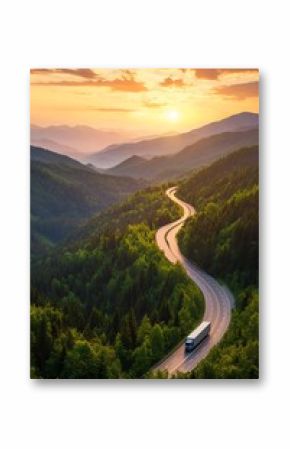 Winding road through mountains at sunset (2)