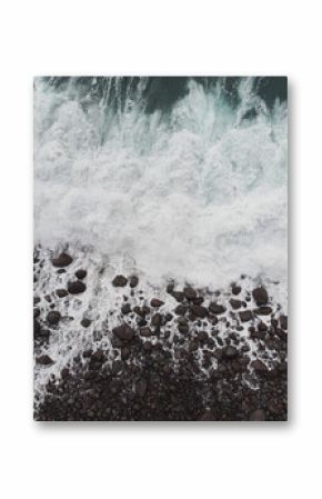 Aerial View of Ocean Waves and Rocky Shoreline