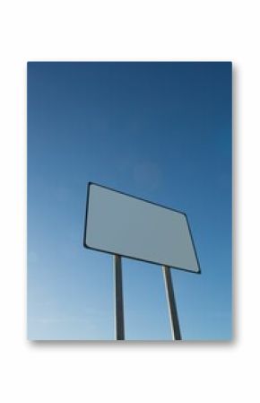 Blank billboard against clear blue sky