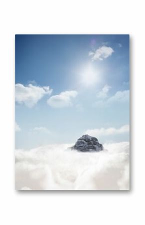 Mountain peak through the clouds