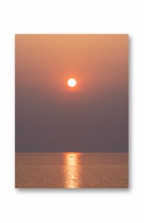 The sun above the sea at sunset. sparkling ripple, sun glitter, water shimmering