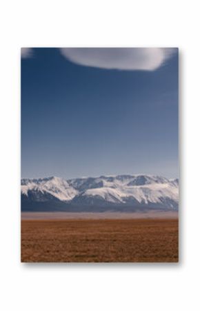 Snow-capped mountains under cloud in Altai Siberia Russia landscape