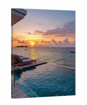 Sunset Over the Ocean Viewed From a Luxurious Infinity Pool on a Tropical Island Retreat