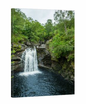 Falls of Falloch waterfall in the Loch Lomond & The Trossachs National Park. A popular beauty spot in a peaceful glen.