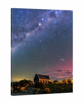 Milky Way, Nebula, Aurora Australis glowing over Church of the Good Shepherd at Lake Tekapo, New Zealand