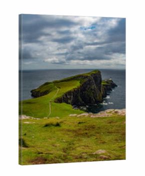 Scotland: view of the sheer cliff of Neist Point lighthouse (1909), famous promontory and viewpoint on the most westerly point on the Duirinish peninsula on the Isle of Skye