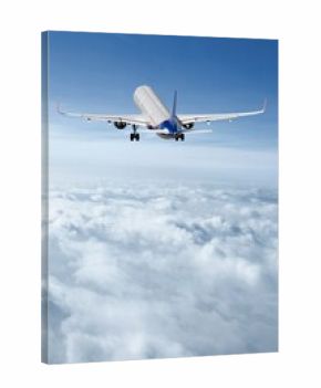 Bright passenger airplane plane flying in sky