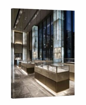 marble floors and sophisticated glass display cases line the illuminated interior of a highend jewelry store