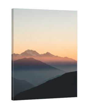 Beautiful sunrise over misty mountain range, minimal style, soft light, high quality