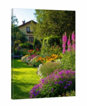 Vibrant flowerbed in a lush garden. Decorating your outdoor area with blooming flowers.