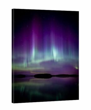 Amazing aurora borealis dancing over lake in Farnebofjarden national park in north of Sweden
