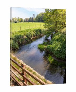 The young River Chelt at Boddington, Gloucestershire, England UK