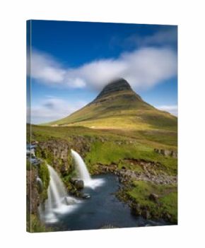 view of the picturesque Kirkjufellsfoss Waterfall o nthe Snaefellsnes Peninsula in western Iceland