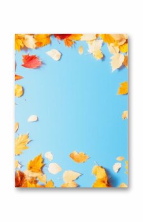 Vibrant Autumn Leaves on Blue Background Perfect for Thanksgiving and Halloween Themes