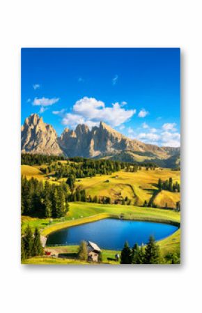 Lake and mountains, Alpe di Siusi or Seiser Alm, Dolomites Alps, Italy.