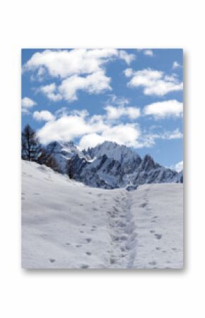 Snow covered peaks of the Sesto Dolomites in clouds, mountains of the Alps, South Tyrol, Italy, Europe