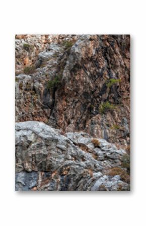 Weathered rock cliff texture background showcasing rugged texture