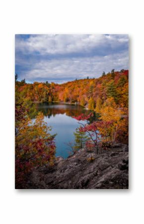 Fall foliage surronding Pink Lake, Gatineau Park, Quebec, Canada 