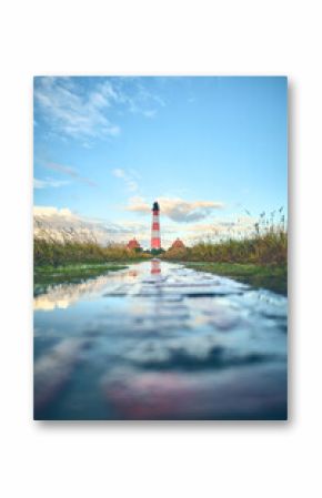 Historic Pathway to Lighthouse at north sea coast. High quality photo