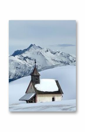 small church in the snow covered mountains