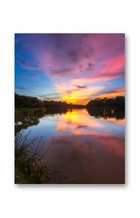 landscape lake views and the reservoir the forest summer water reflection with Twilight blue bright and orange yellow dramatic sunset sky in beach colorful nature background.