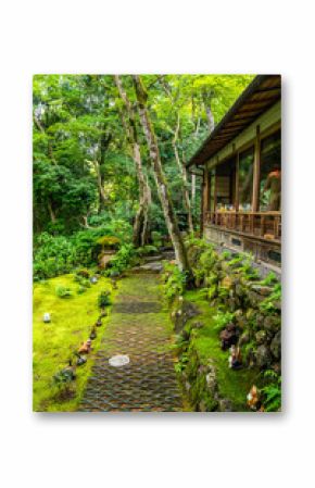 Japanese garden view with reflection and flowers, in Arashiyama Kyoto, Japan