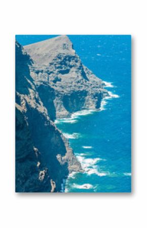 Aerial view from Mirador del Balcon, mountains and cliffs overlooking the ocean, winding roads. Gran Canaria, Spain