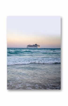 Cruise ship on the ocean. Luxury liner at ocean. Miami Beach with cruise ship. Turquoise water and cruise liner. Tourist cruise ship near the coast. Ocean waves and vessel boat.