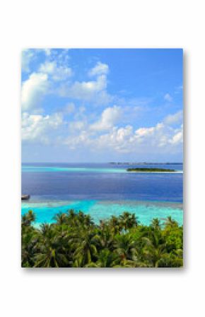 Scenic panoramic view of tropical islands surrounded by deep blue ocean with palm trees in the foreground, maldives summer travel, island getaway, nature beauty