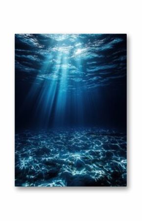 Underwater scene with ocean waves illuminated by sunrays from above
