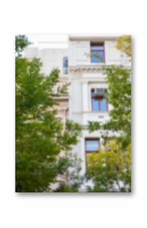 Building with trees on foreground