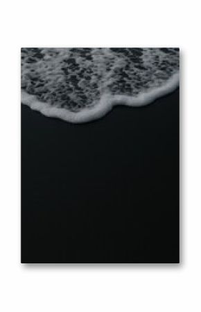 Serene waves meet dark shore.