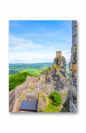 Visitors enjoy the panoramic views from Panna Tower in Trosky Castle Ruins. Nestled in Bohemian Paradise, this site showcases medieval architecture against a stunning landscape.