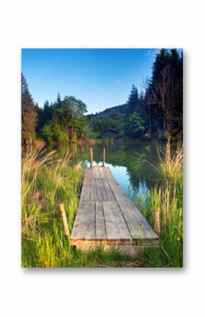 Autumn Reflections: Wooden Pier by the Mountain Lake