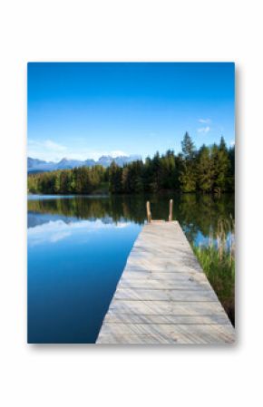 Tranquil Autumn Pier with Mountain Peaks