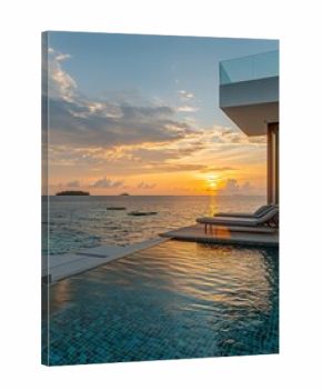 Luxurious Beachfront Villa With Infinity Pool at Sunset Overlooking Calm Ocean Waters