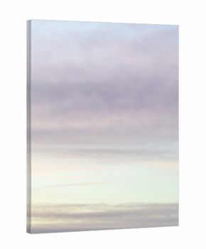 banded blue, light gray, yellow cloudy sky in dusk