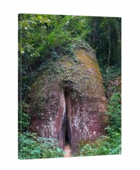Rock formations in Danxia Mountains (Danxiashan) in Renhua County in Shaoguan in China. Yuan Stone or Yinyuan hole, also known as Feminine Stone, known for its shape resembling vulva.