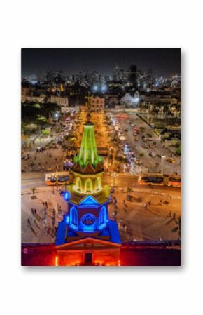 Beautiful Aerial view of the walled city of Cartagena de Indias in Colombia. Its Clock Tower entrance, the plaza, the sanctuary and the Domus Dei at night