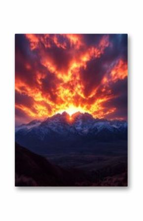 Fiery Sunset Sky Over Snow Capped Mountains