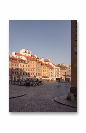 The old market square, or Rynek Starego Miasta in Polish, in the middle of Warsaw Old Town or Stare Miasto early in the morning.