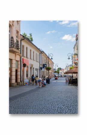 Deptak na starym mieście w Nowym Sączu w słoneczny dzień   Alley in the old town in Nowy Sącz by sunny day