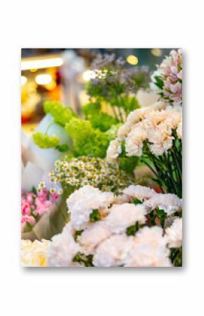 Colorful flower display at a local market showcasing seasonal blooms and fresh arrangements during the spring season
