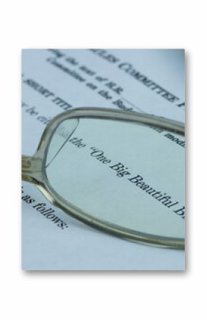 Closeup of the documents of the One Big Beautiful Bill Act (OBBBA), a budget reconciliation bill in the 119th United States Congress.