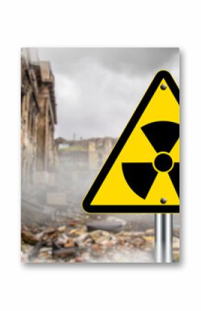 Radiation warning sign in front of a ruined, abandoned building with smoke and debris, symbolizing danger, contamination, or nuclear disaster. Nuclear hazard, disaster zone.
