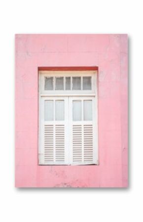Vintage white window set in a textured pink wall, showcasing a minimalist architectural design